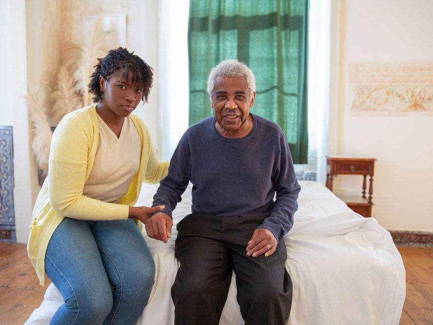 A YourCareNow carer with a client in her Altrincham home