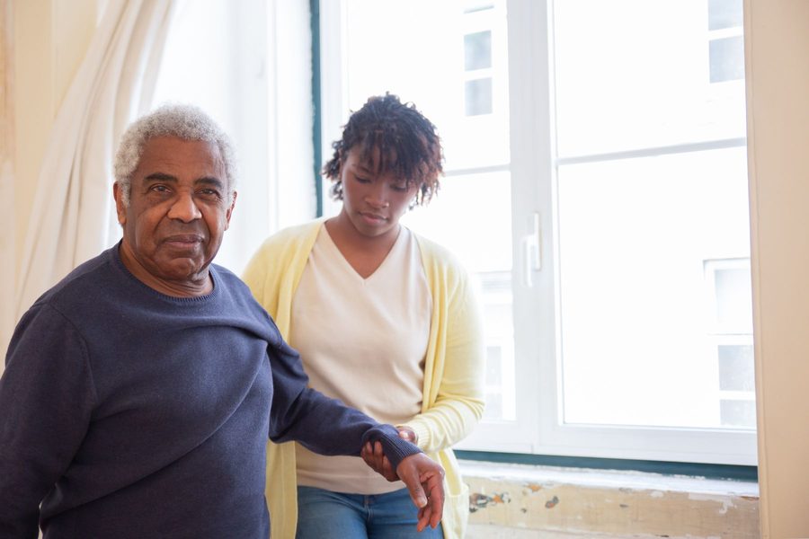 Live-in carer with a resident in a bright home